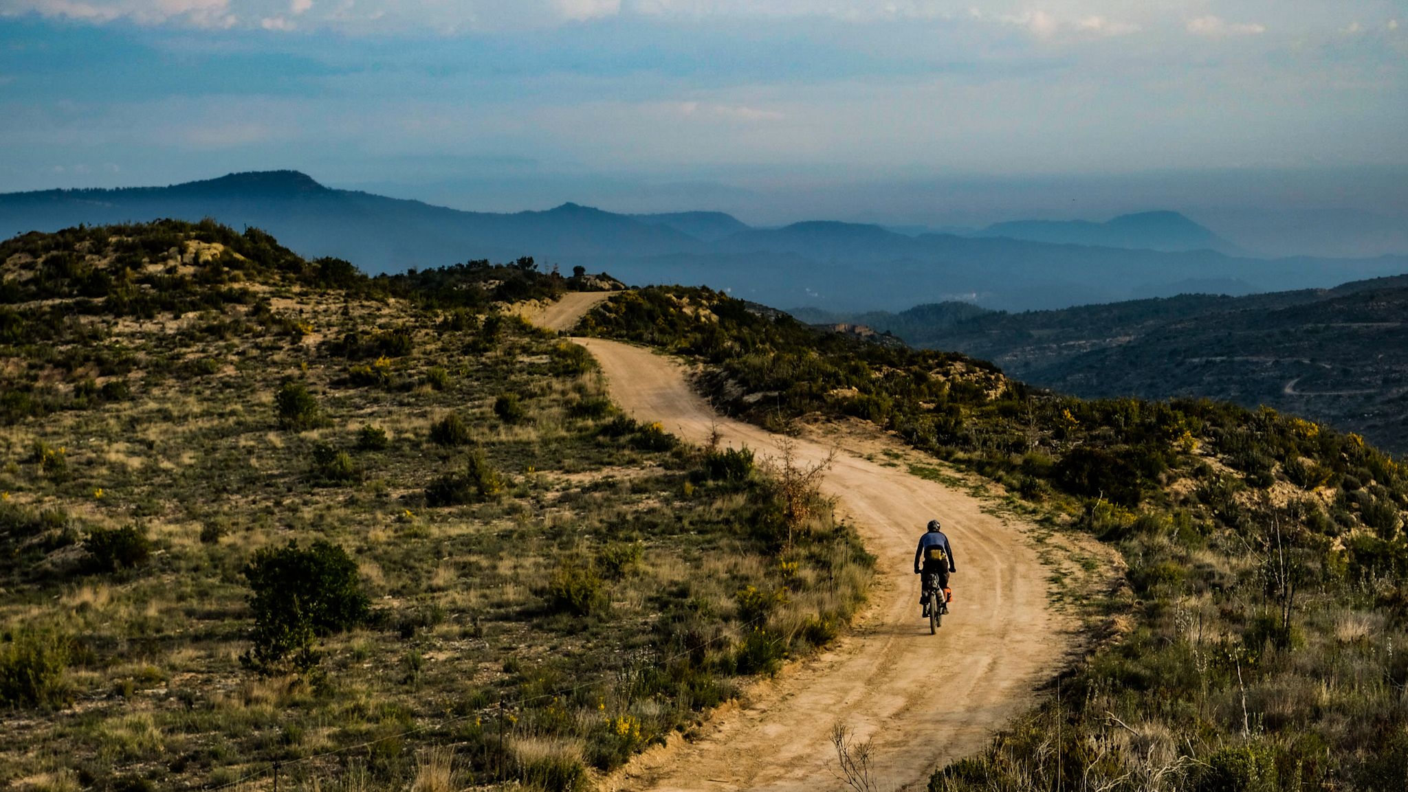 Andy Cox riding his bike