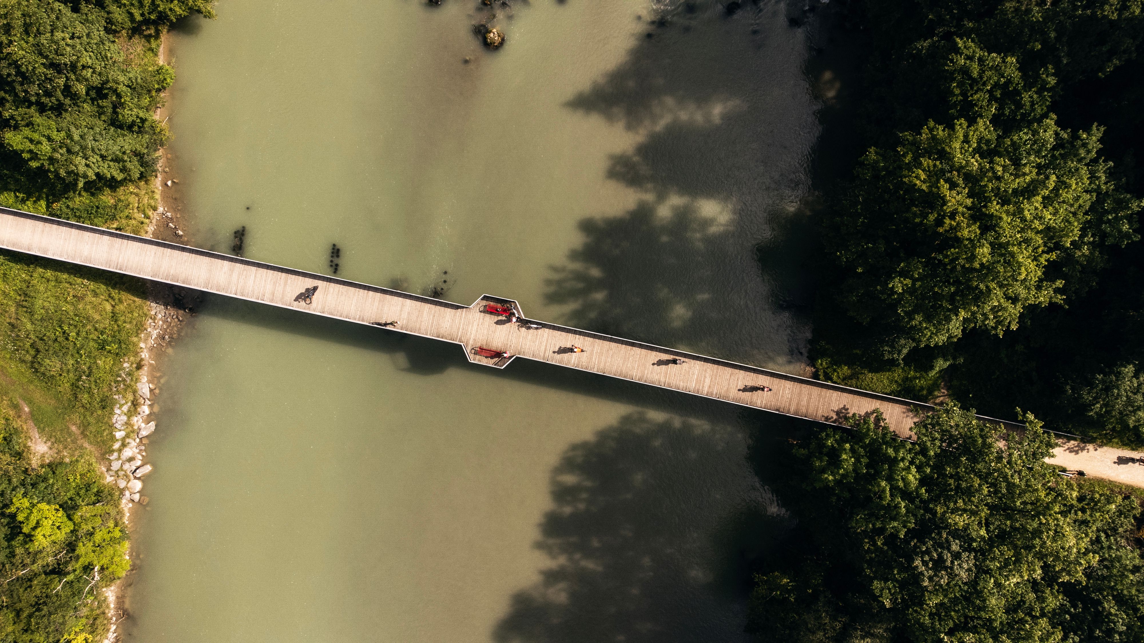 The Saalach river is wide and straightened with many dams controlling the flow of the river.