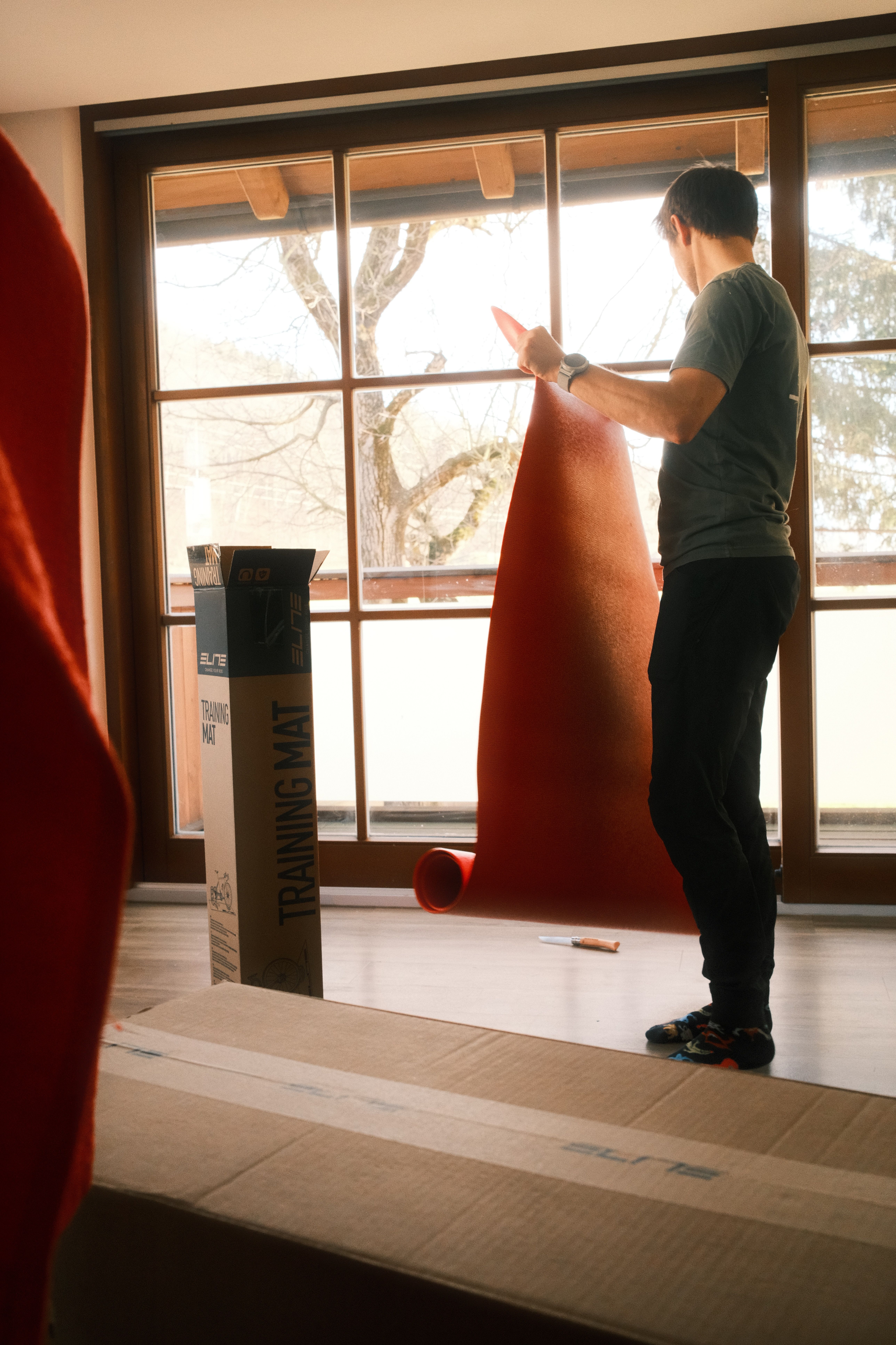 The first step to build your indoor cycling setup should be to make space for your trainer mat.