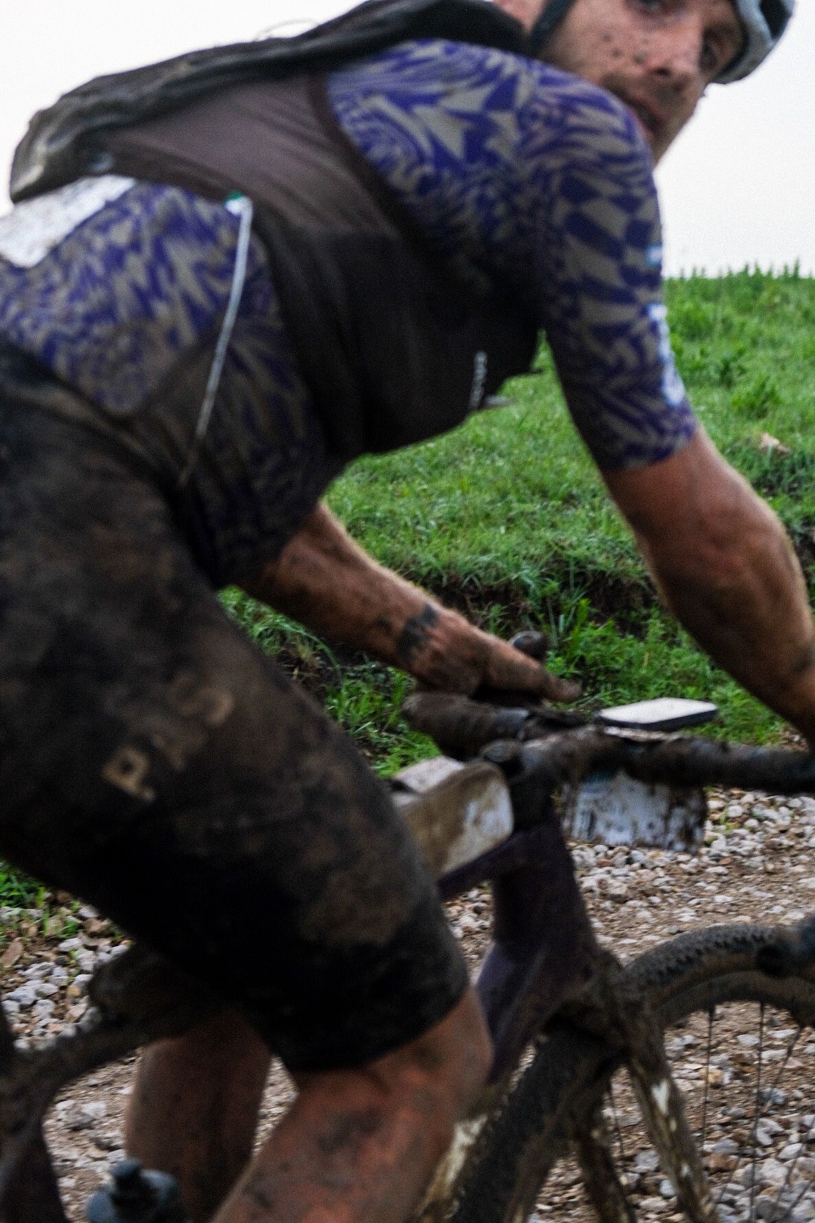 Check the weather forecast, before you go to Unbound Gravel in Kansas! Mattia de Marchi in peanut butter mud.