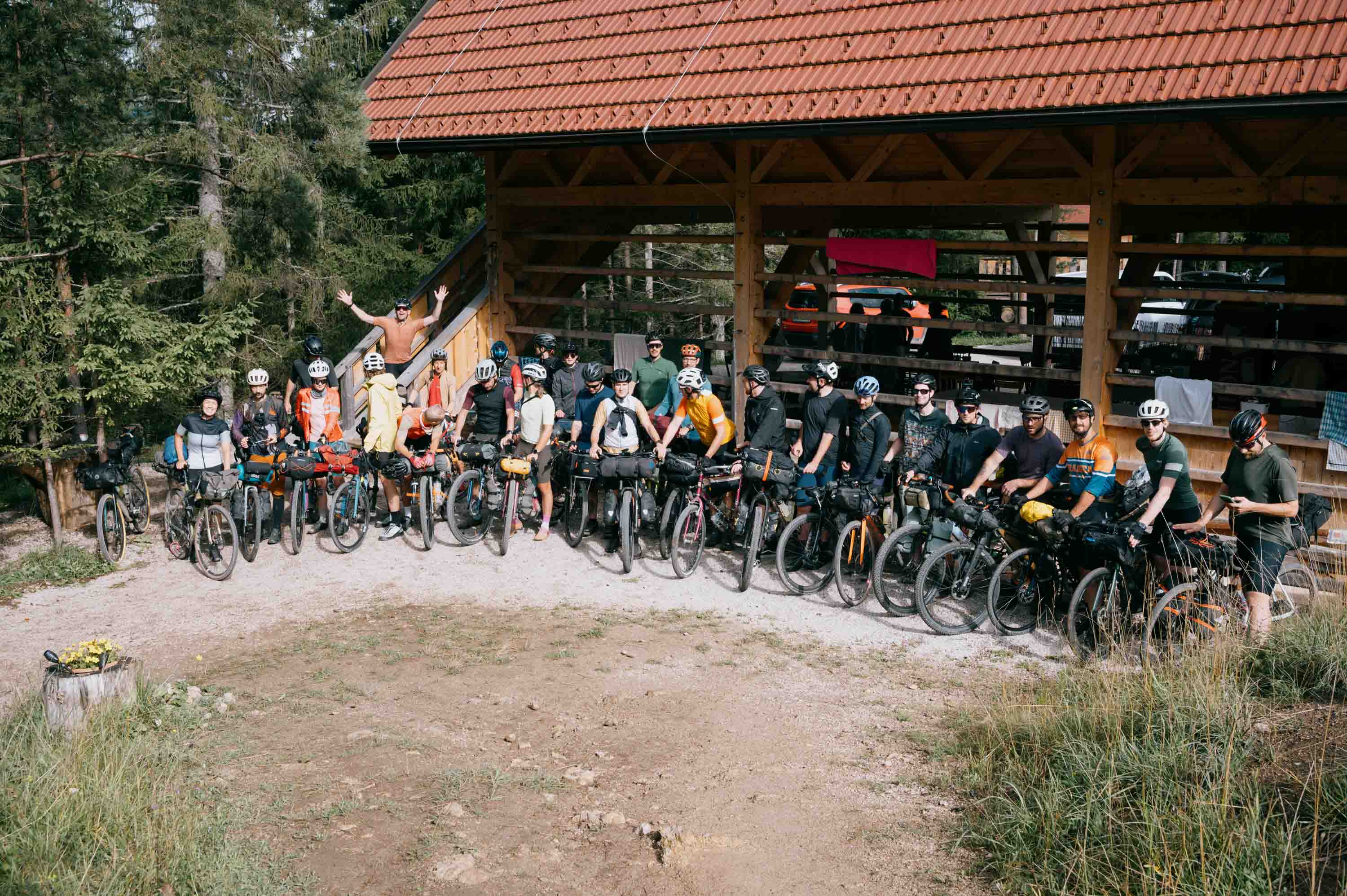 Group picture of Loose in the Woods 2025 at camp before riding to Ljubljana