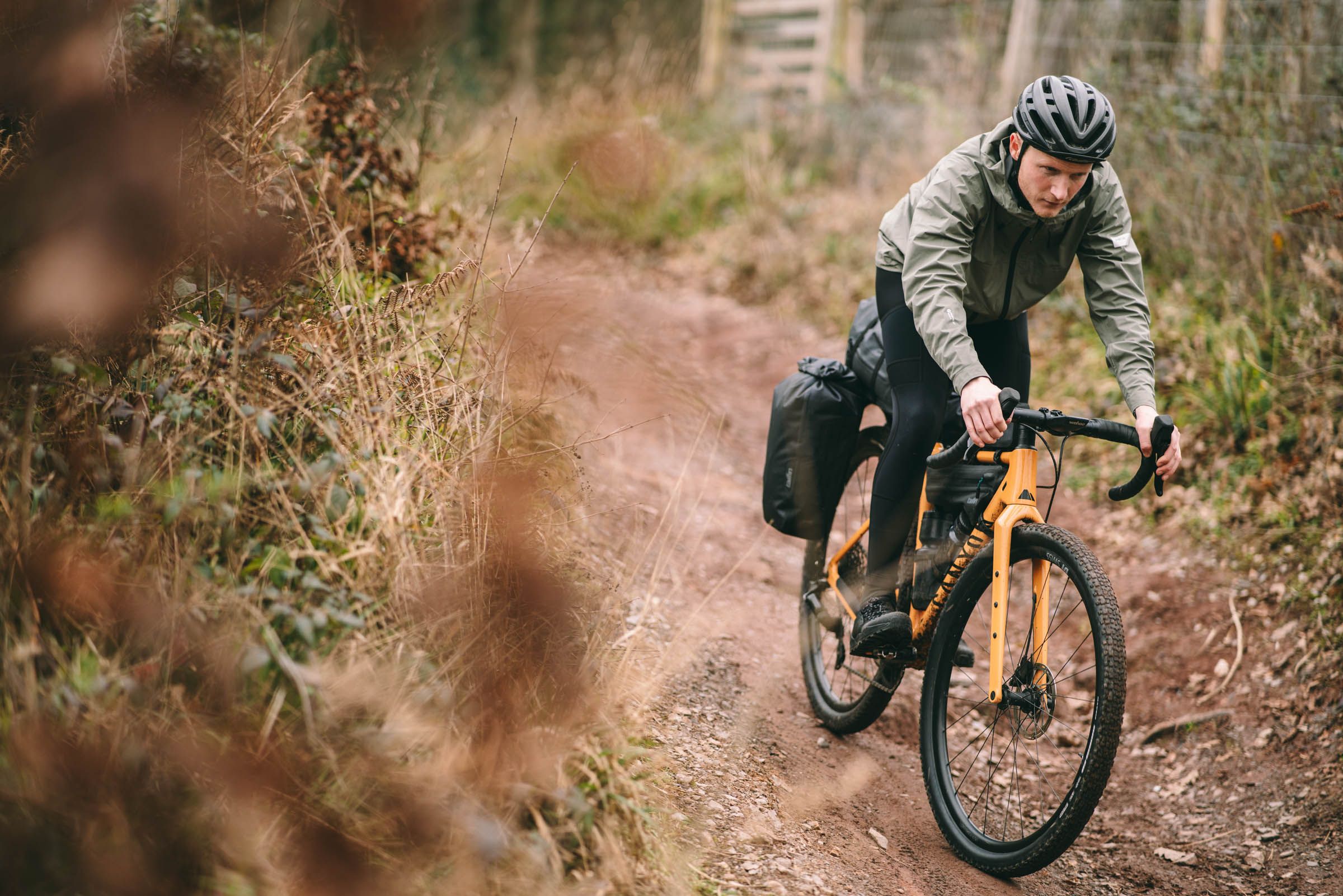 Tailfin clamp system for panniers is designed for rough off-road bikepacking trips.