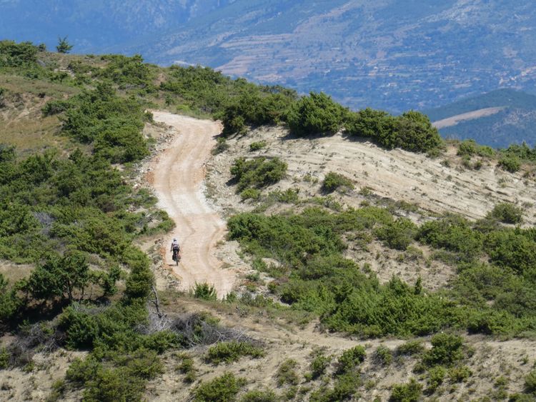 Rough gravel roads lead through the Balkans close to the Adria.