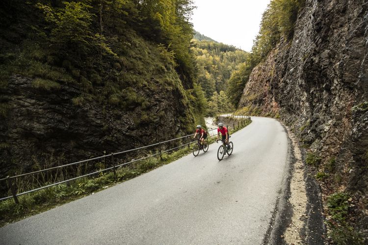 The Postalm road winds through a rocky george.