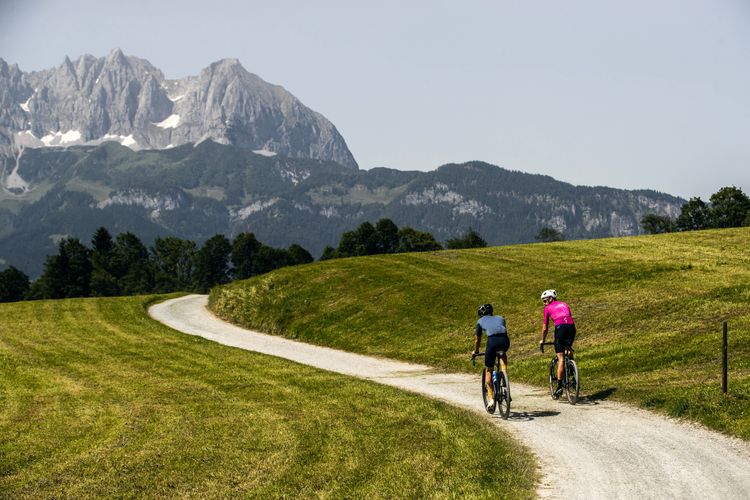 Nice gravel path leading to St. Johann in Tirol with the Wilder Kaiser Mountains in the back.