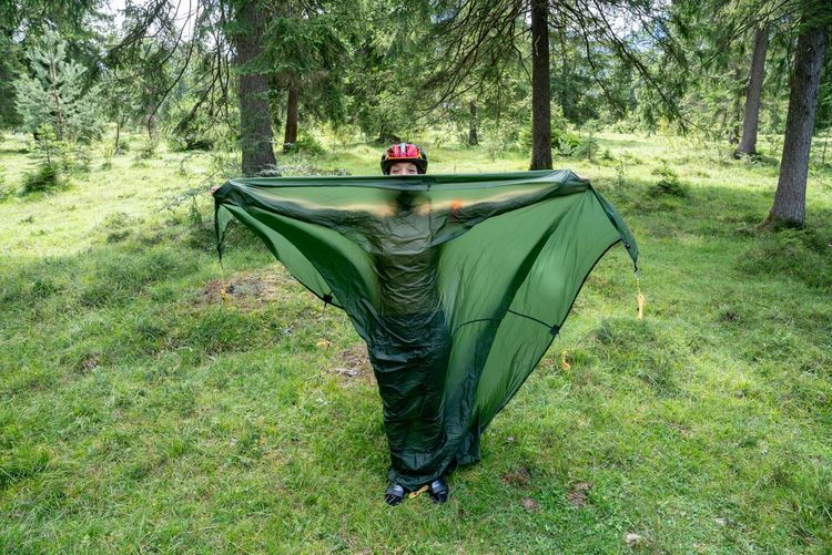 A tarp is actually just a thin sheet that protects you from rain from above. Not a complete tent.