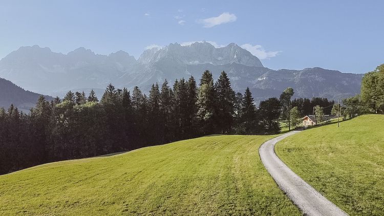 Gravelriding in the Kitzbühel Alps in Tirol with views on the WIlder Kaiser Mountains.
