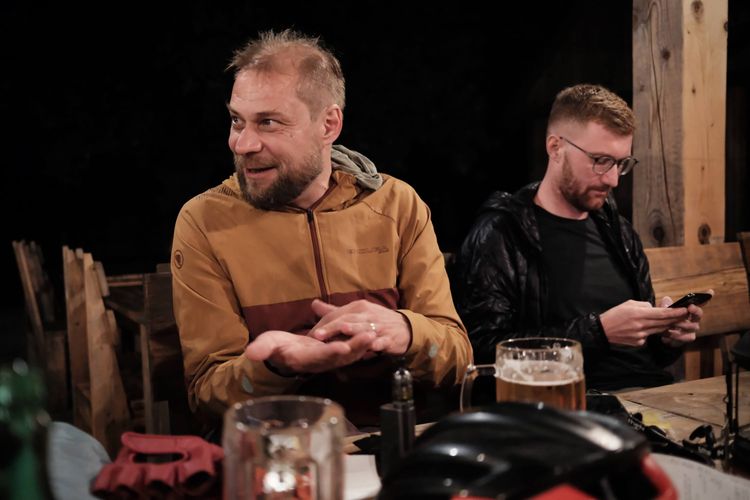 Samo paying the big bill at the camp after many beers!