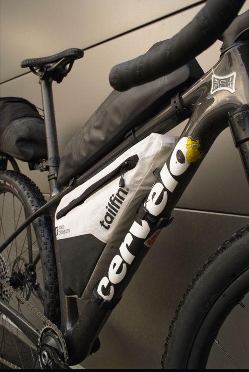 The custom Tailfin R&D full frame bag dominates the setup.