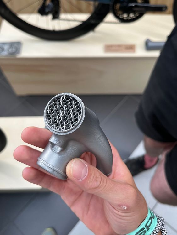 Custom 3D printed seat tube cluster for Quirk cycles at bespoked. Yes, thats steel.